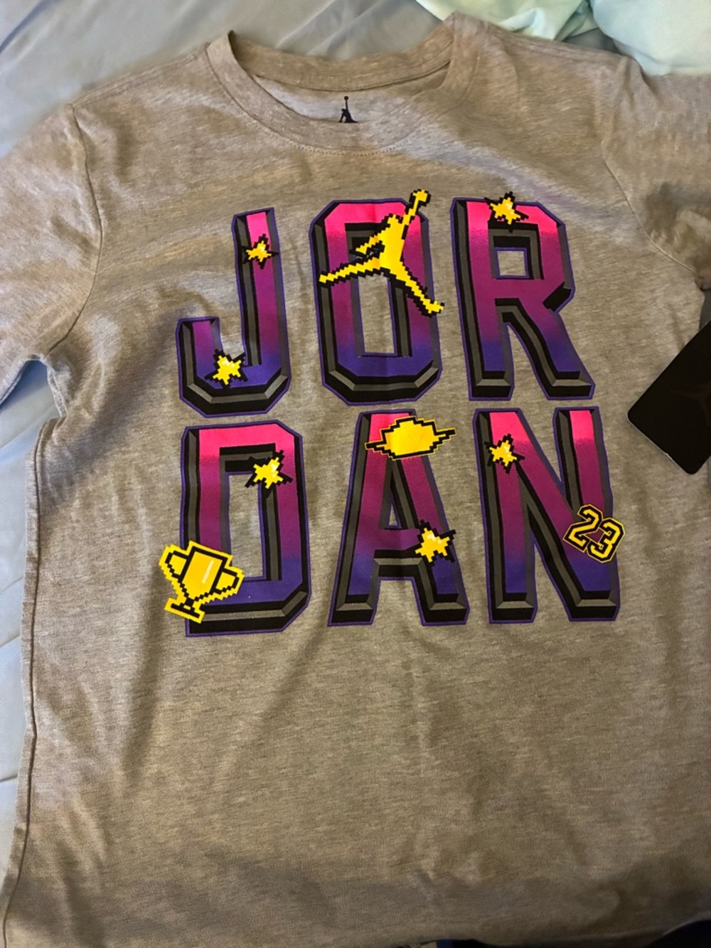 Jordan Kids Gray Tee with Pink & Purple Block Logo and Yellow Accents